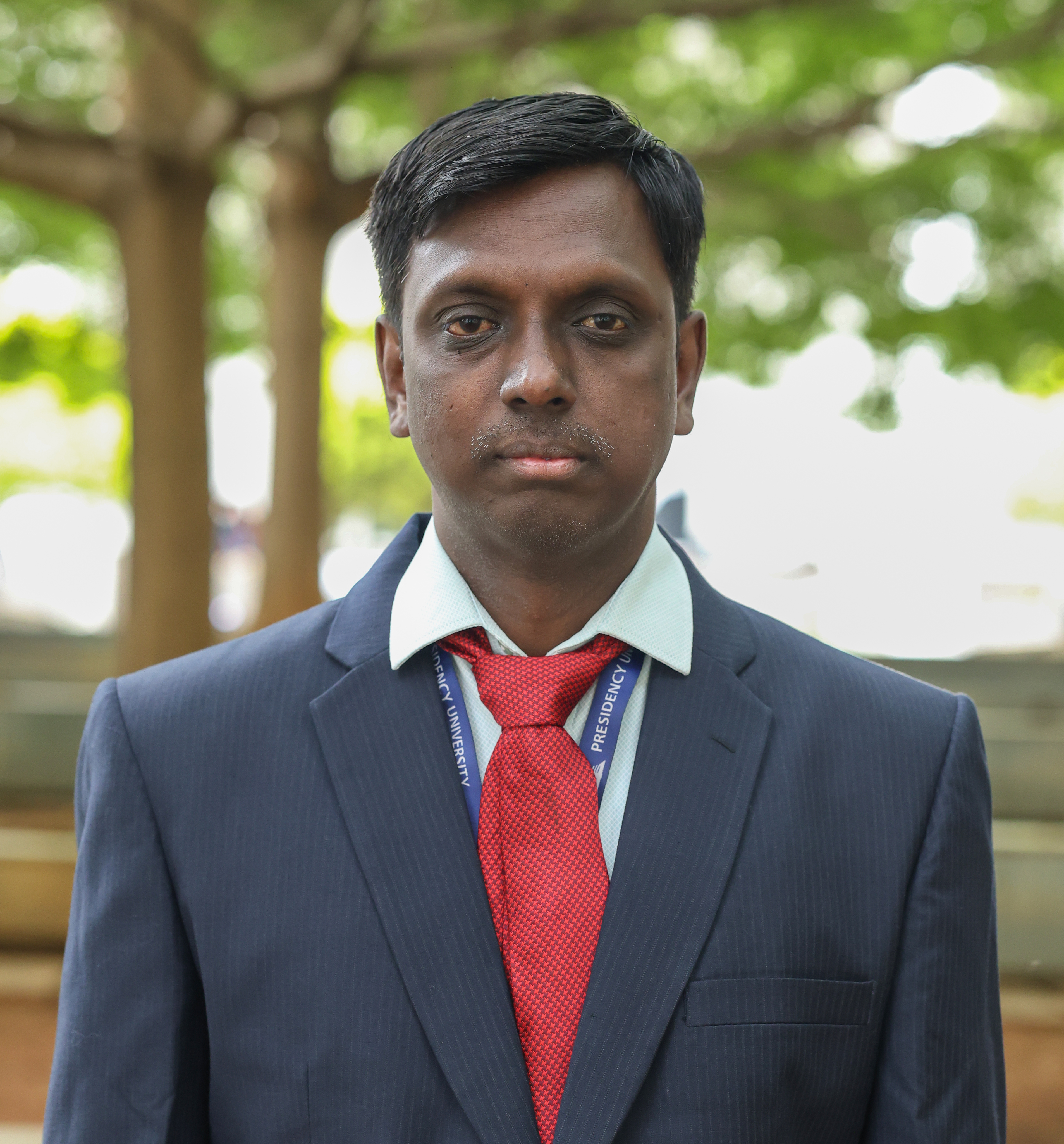 Dr. Manikandan T.