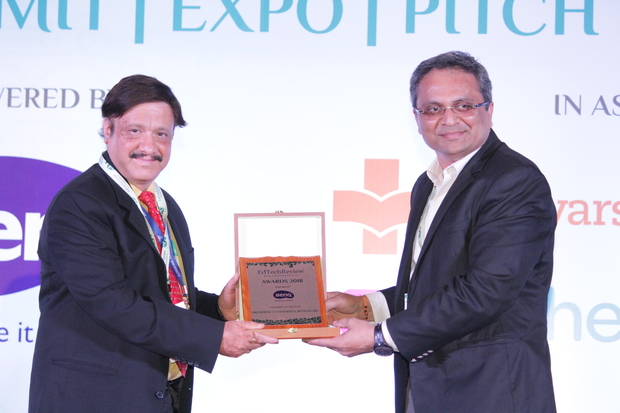 Former Vice Chancellor, Dr. Nagendra Parashar, Receiving The Award University Of The Year - 2018